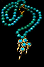 SPLENDID TURQUOISE CROSS, 18K GOLD VERMIEL ON TURQUOISE STRAND